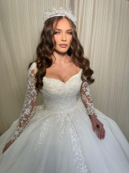 Création de robe de mariée sur-mesure